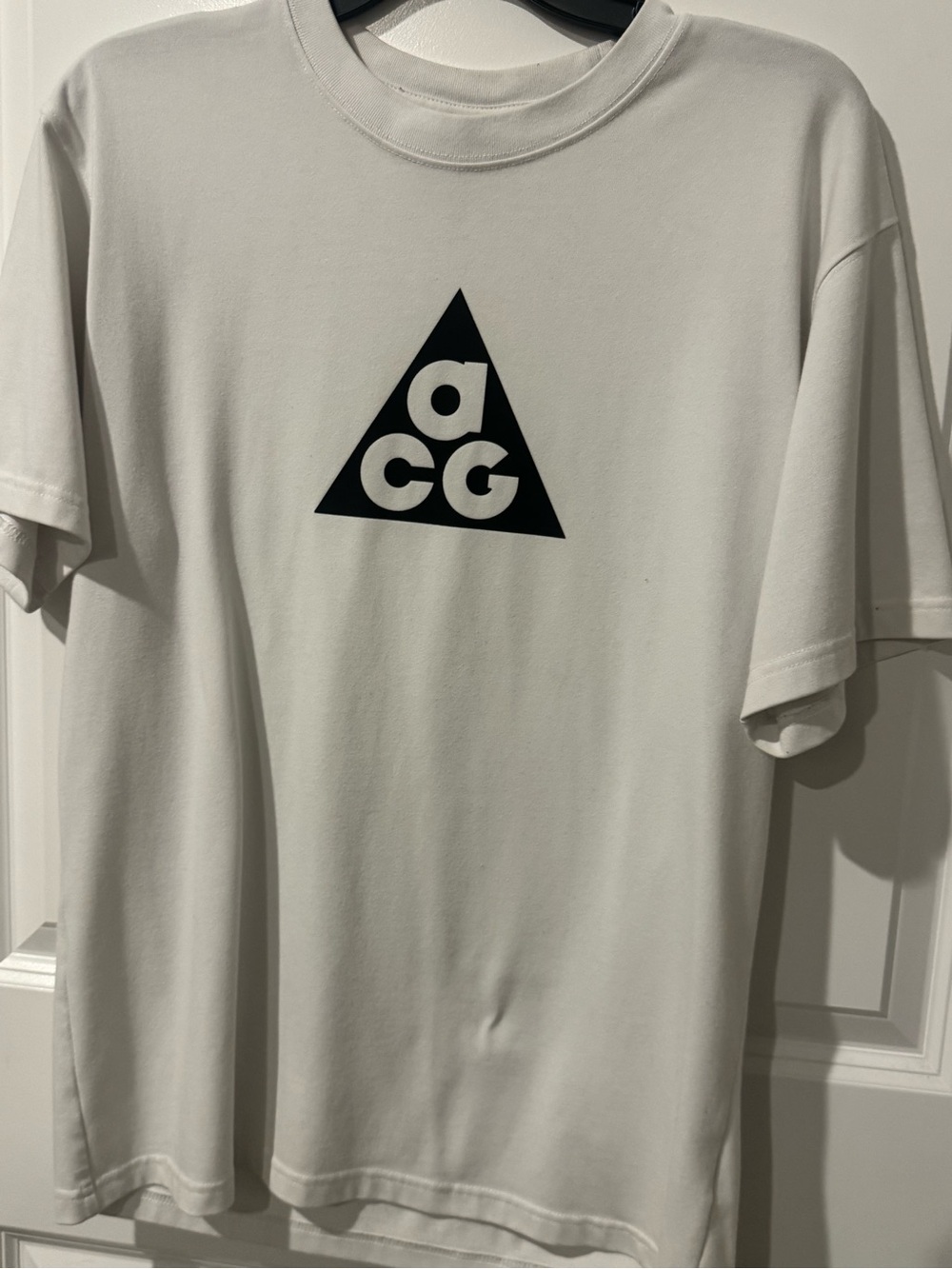 Nike White Short-Sleeve T-Shirt with Black ACG Triangle Logo